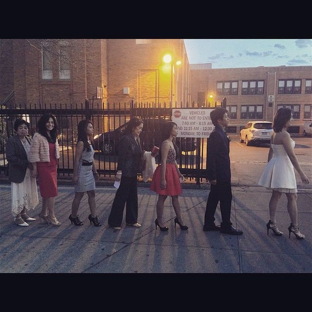 PEOPLE STANDING ON STREET