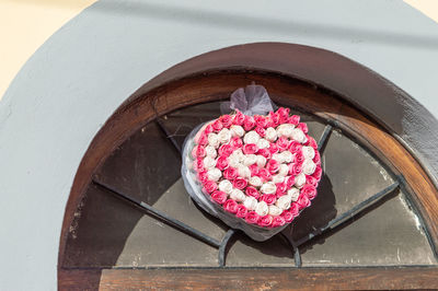 High angle view of pink cake on table