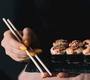 Close-up of hand holding food