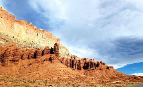 Rock formations on mountain against sky