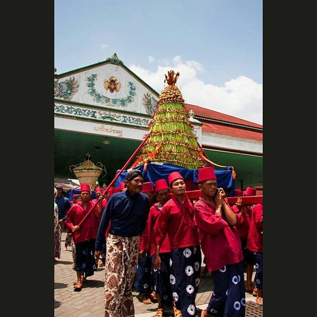 religion, large group of people, person, men, spirituality, place of worship, cultures, lifestyles, tradition, leisure activity, celebration, transfer print, temple - building, human representation, famous place, art and craft, crowd, tourism, travel destinations