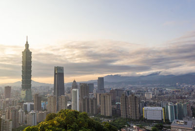 Modern buildings in taipei city against sky