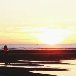 Scenic view of sunset over sea
