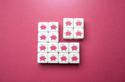 High angle view of gingerbread cookies on yellow background