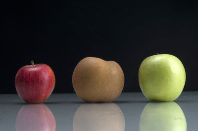 Close-up of apples on black background