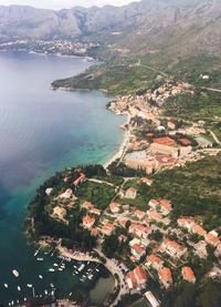 High angle view of townscape by sea