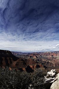Aerial view of landscape against cloudy sky