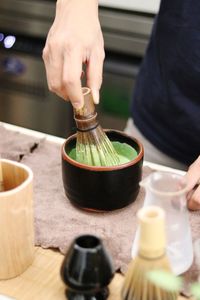 Close-up of hand holding drink