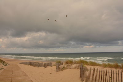 Scenic view of beach against sky