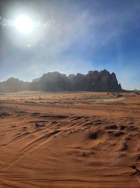 Scenic view of desert against sky