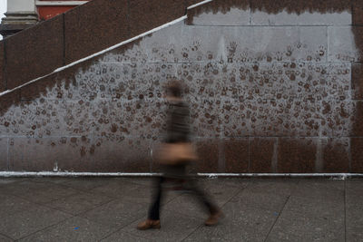 Man walking in corridor