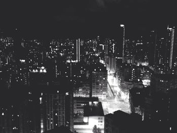 Illuminated cityscape at night