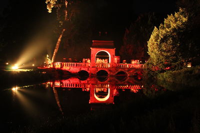 Reflection of illuminated buildings in water