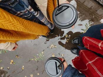 Low section of people standing on floor