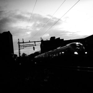 Silhouette of buildings against sky