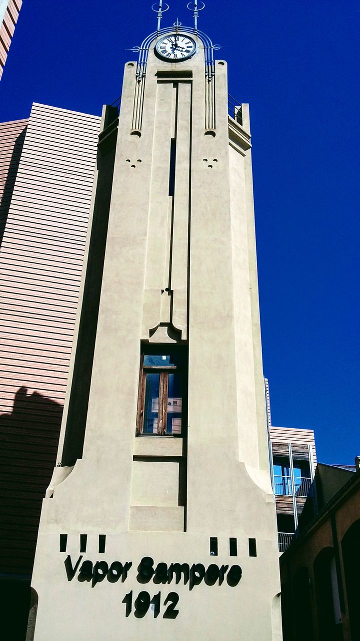 building exterior, architecture, built structure, low angle view, outdoors, tower, day, no people, religion, sky, clock