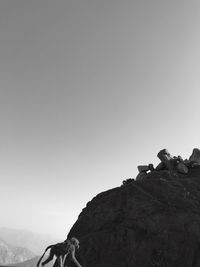 Low angle view of rock formation against clear sky