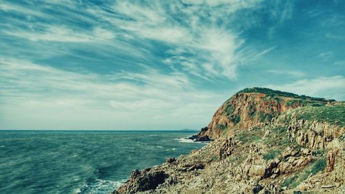 Scenic view of sea and cliff