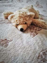 Close-up of stuffed toy on bed