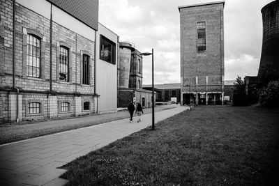 People walking on street in city