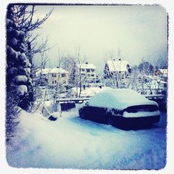 Snow covered houses in winter