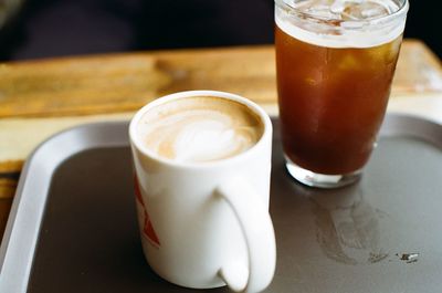 Close-up of cappuccino served on table