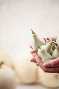 Close-up of hand holding ice cream