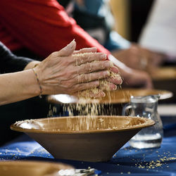 Close-up of hands food in bowl