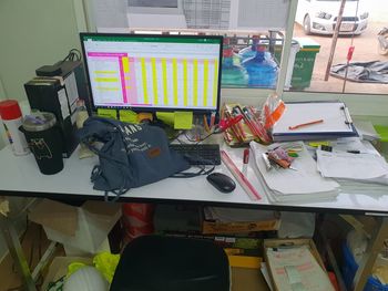 High angle view of worker working on table