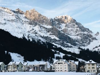 Scenic view of snowcapped mountains against sky