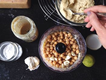 High angle view of person preparing food in plate