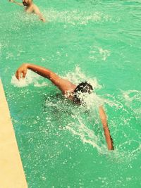 High angle view of man swimming in pool