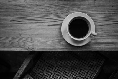 High angle view of coffee cup on table