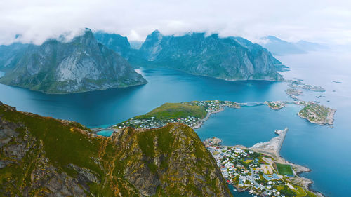 Panoramic view of sea and mountains against sky ,reine, lofoten, norway 