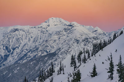 Scenic view of mountains against sky during winter