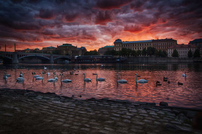 Dramatic sky over river at dusk