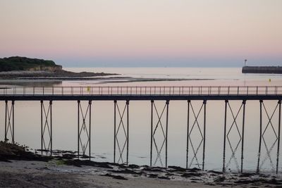 Scenic view of sea against clear sky during sunset