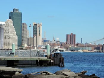 View of cityscape against blue sky