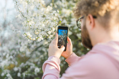 Young woman using mobile phone