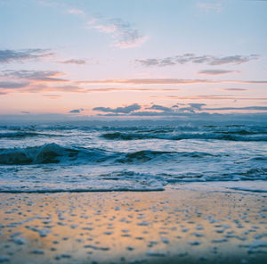 Scenic view of sea against sky during sunset