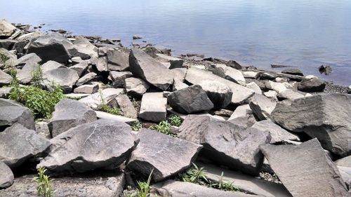 Close-up of rocks by sea