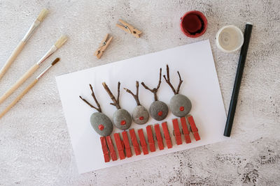 High angle view of objects on table against wall