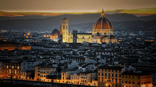 Aerial view of a city at sunset