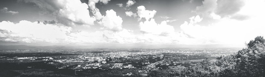 Panoramic shot of cityscape against sky