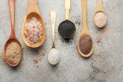 High angle view of wooden spoons on table