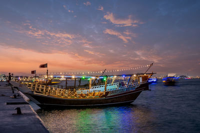 Cruise dhow at doha corniche downtown sunset time
