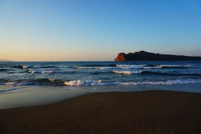 Scenic view of sea at sunset