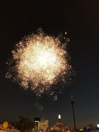 Firework display at night