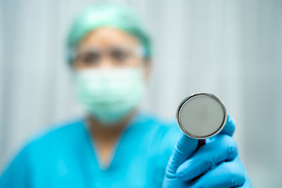 Doctor with stethoscope at hospital