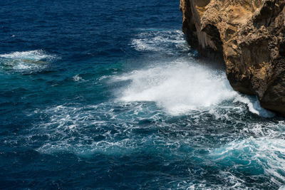 Powerful waves crushing on a rocky beach. rocky coastline and sea